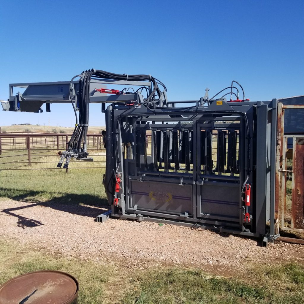 SILENCER Hydraulic Chute with Crash Cage Lifted